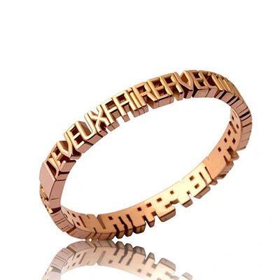 Fine bague en or rose gravée du message Je Veux par Bruno Caby